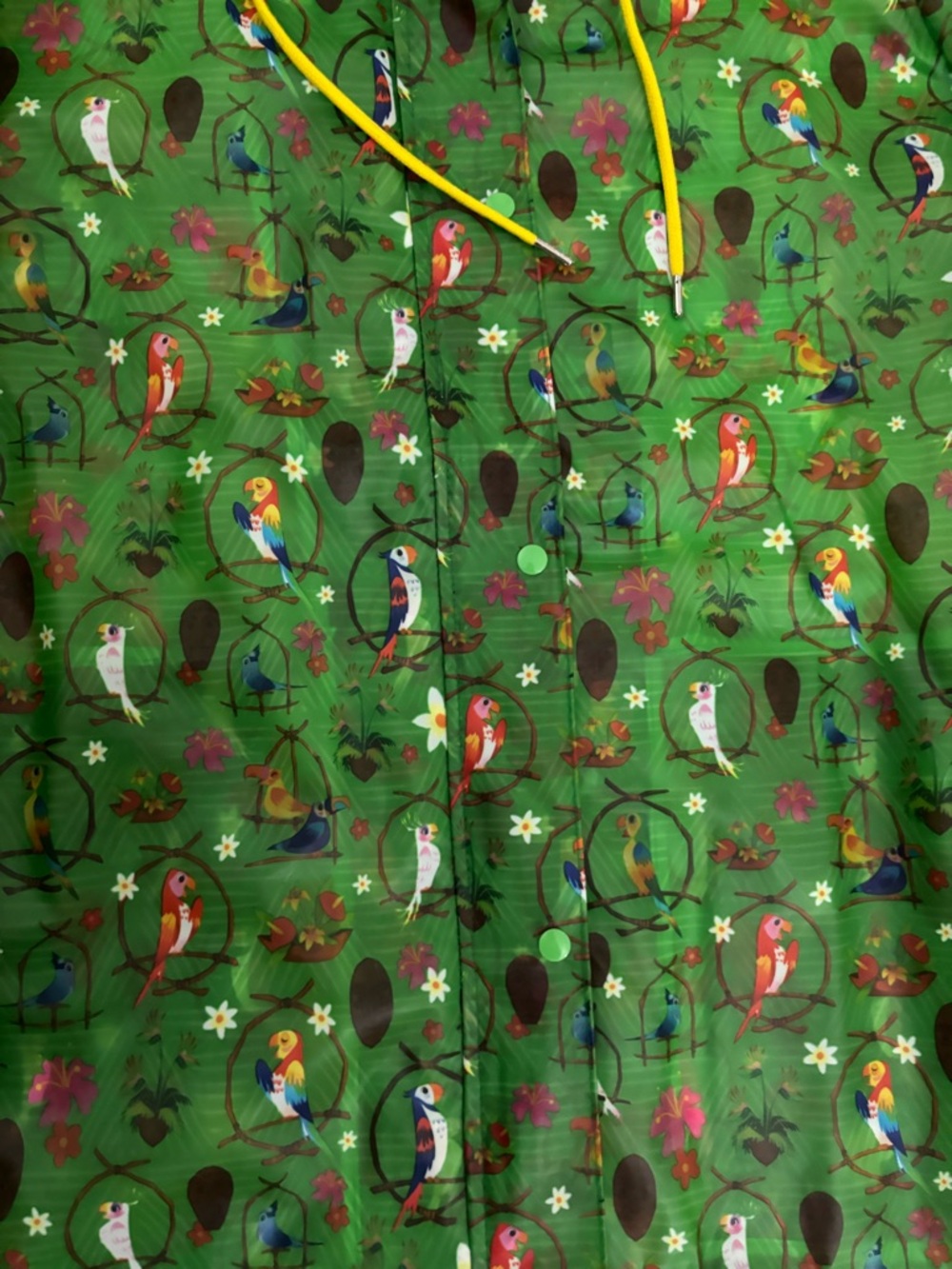 Disney Enchanted Tiki Room Green Hooded Rain Jacket - Picture 2 of 9
